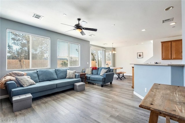 6121 Mission Gorge Ct, Las Vegas, NV 89130 - living room featuring ceiling fan, light wood finished floors, baseboards, and recessed lighting