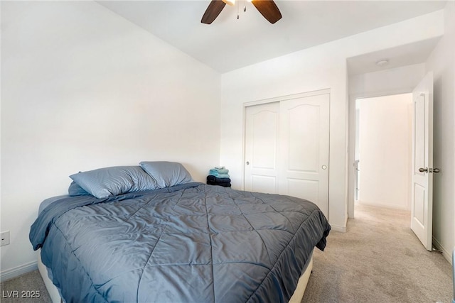 6121 Mission Gorge Ct, Las Vegas, NV 89130 - bedroom with light carpet, a closet, baseboards, and ceiling fan