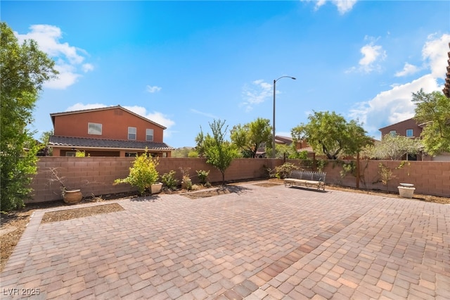 11238 Meadow Cove St, Las Vegas, NV 89179 - fenced backyard featuring a patio area