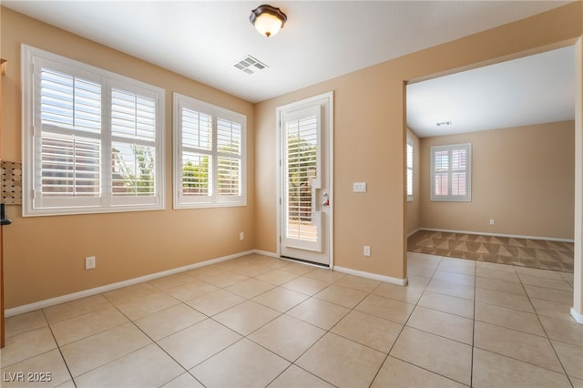 11238 Meadow Cove St, Las Vegas, NV 89179 - unfurnished room with light tile patterned floors and baseboards