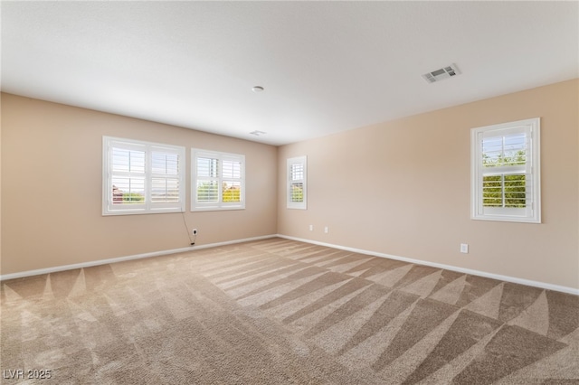 11238 Meadow Cove St, Las Vegas, NV 89179 - carpeted spare room with baseboards