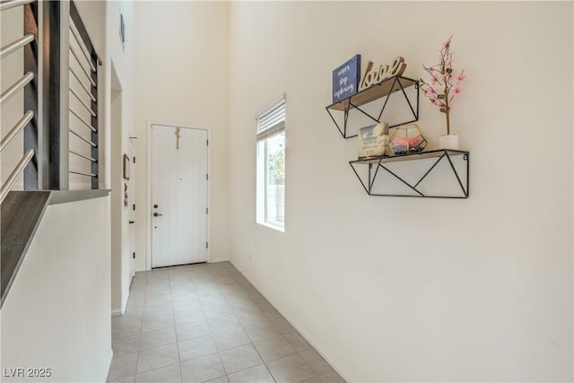 10031 Fletcher Peak Ave, Las Vegas, NV 89178 - corridor featuring a high ceiling and baseboards