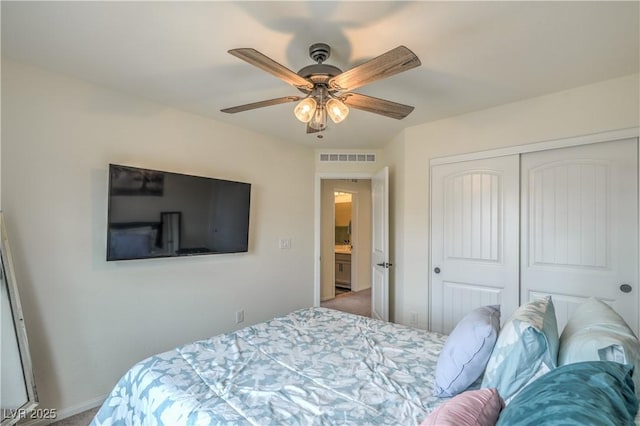 10031 Fletcher Peak Ave, Las Vegas, NV 89178 - bedroom with carpet, a closet, and ceiling fan