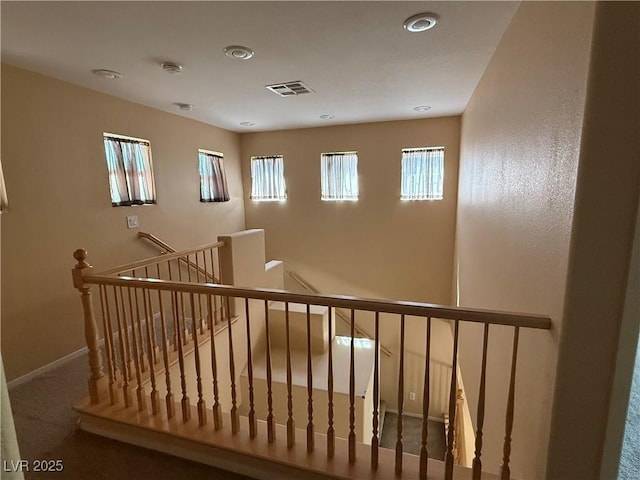 8708 Gateway Glen Dr, Las Vegas, NV 89178 - stairway with healthy amount of natural light, carpet, baseboards, and recessed lighting