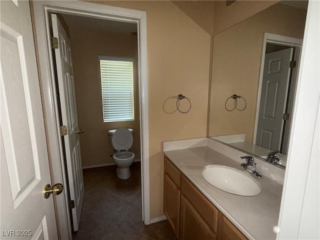 8708 Gateway Glen Dr, Las Vegas, NV 89178 - bathroom with vanity, toilet, tile patterned flooring, and baseboards