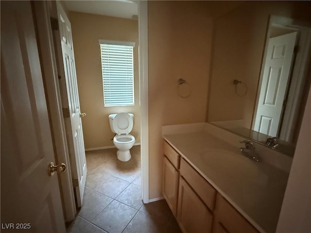 8708 Gateway Glen Dr, Las Vegas, NV 89178 - bathroom with vanity, tile patterned flooring, toilet, and baseboards