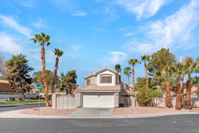 125 Firecreek Cir, Las Vegas, NV 89107 - view of front of house featuring an attached garage, a tile roof, a gate, stucco siding, and driveway