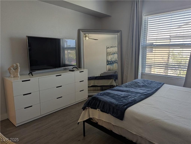 6650 W Warm Springs Rd Unit 2159, Las Vegas, NV 89118 - bedroom featuring wood finished floors and multiple windows