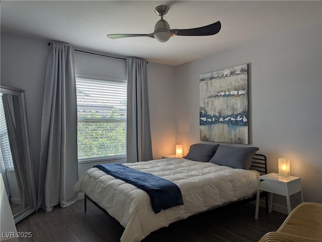 6650 W Warm Springs Rd Unit 2159, Las Vegas, NV 89118 - bedroom featuring wood finished floors, ceiling fan, and baseboards