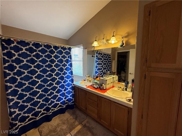 5517 Rock Creek Ln, Las Vegas, NV 89130 - full bathroom featuring vaulted ceiling, double vanity, and a shower with curtain