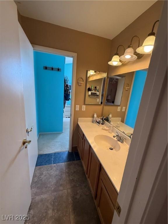 5517 Rock Creek Ln, Las Vegas, NV 89130 - bathroom with vanity and tile patterned floors