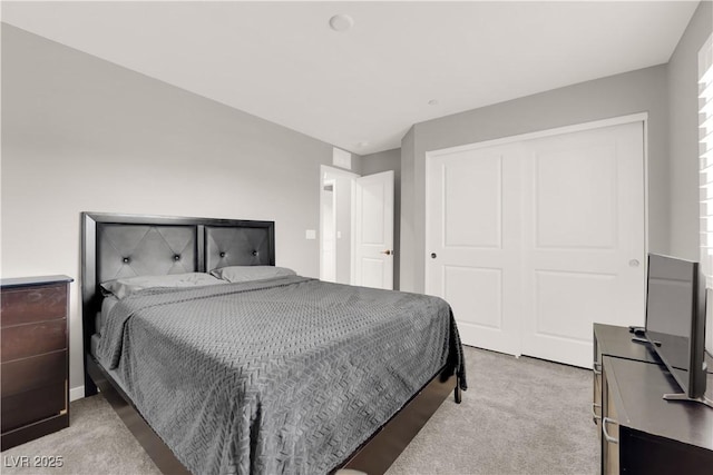 872 Pointe Arbor St, Henderson, NV 89011 - bedroom featuring light carpet and a closet