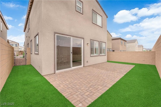 872 Pointe Arbor St, Henderson, NV 89011 - back of house with stucco siding and a patio