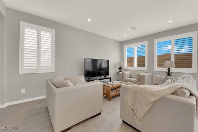 872 Pointe Arbor St, Henderson, NV 89011 - living room with recessed lighting, baseboards, and light wood-type flooring
