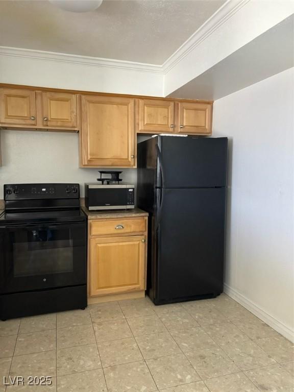 3930 University Center Dr Unit 702, Las Vegas, NV 89119 - kitchen with black appliances, ornamental molding, baseboards, and brown cabinets