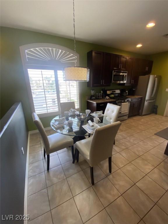 1511 Cardinal Peak Ln Unit 201, Las Vegas, NV 89144 - dining space with light tile patterned floors and recessed lighting