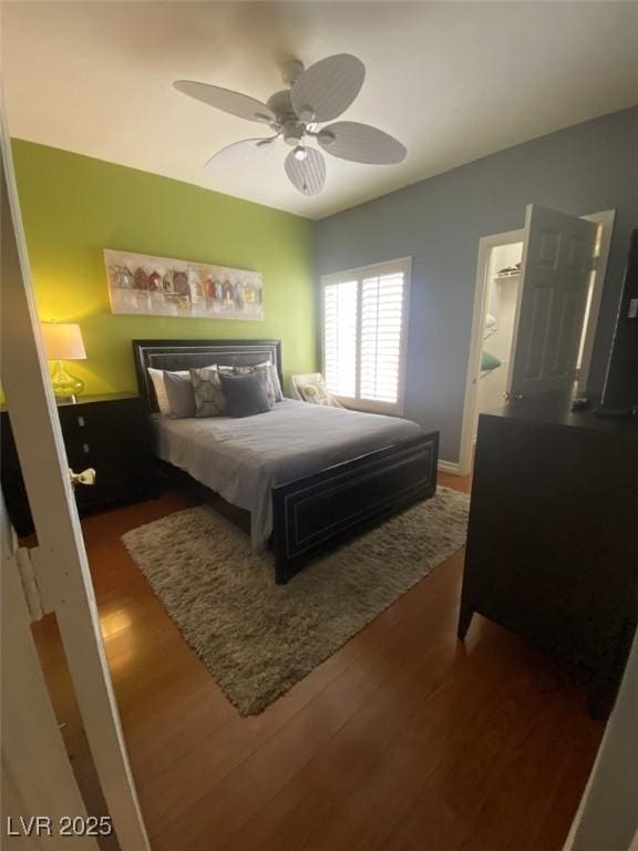 1511 Cardinal Peak Ln Unit 201, Las Vegas, NV 89144 - bedroom with wood finished floors and a ceiling fan