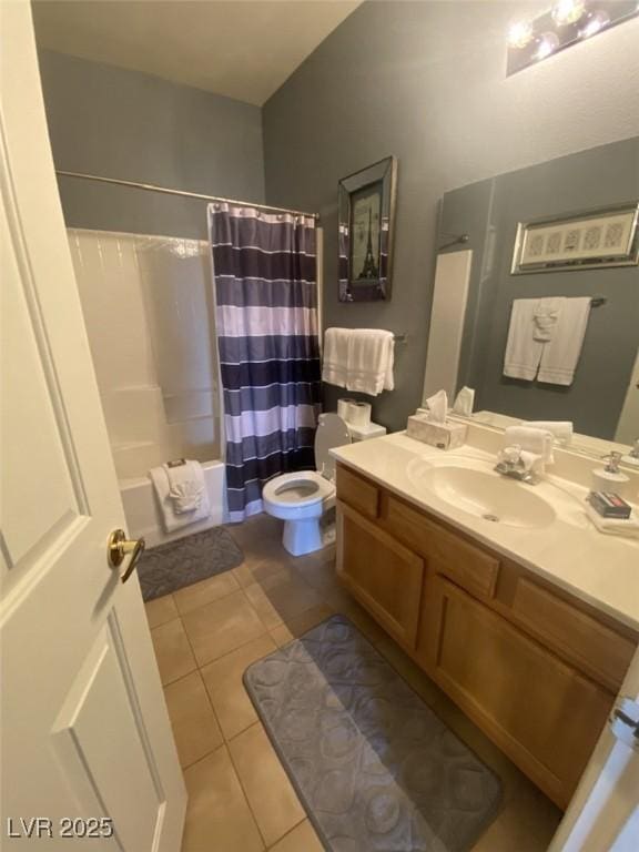 1511 Cardinal Peak Ln Unit 201, Las Vegas, NV 89144 - full bathroom featuring tile patterned floors, toilet, vanity, and shower / bathtub combination with curtain