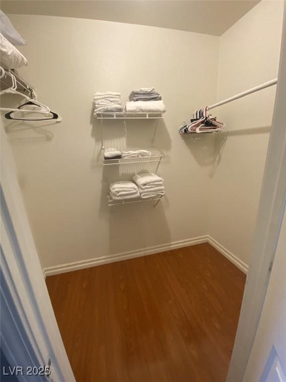 1511 Cardinal Peak Ln Unit 201, Las Vegas, NV 89144 - walk in closet featuring wood finished floors