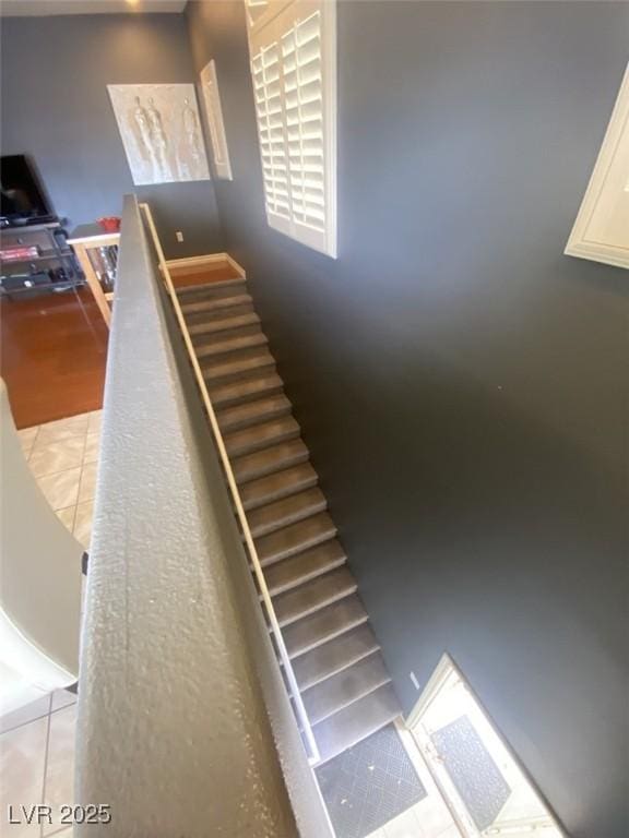 1511 Cardinal Peak Ln Unit 201, Las Vegas, NV 89144 - stairway featuring tile patterned floors