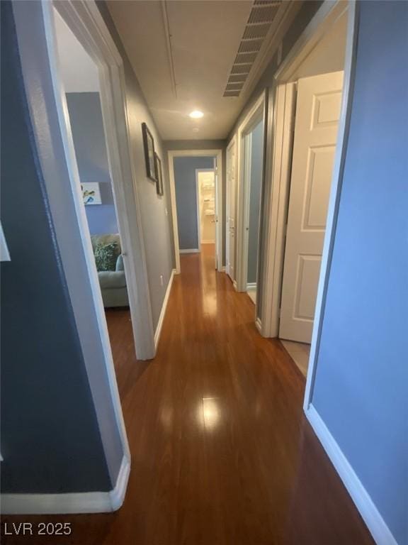 1511 Cardinal Peak Ln Unit 201, Las Vegas, NV 89144 - hallway featuring wood finished floors and baseboards