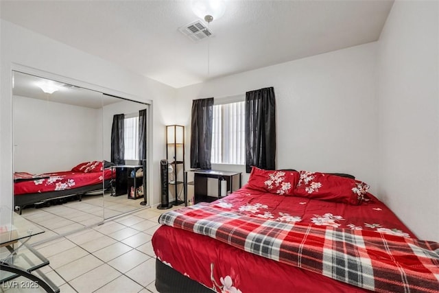 341 Waterwheel Falls Dr, Henderson, NV 89015 - tiled bedroom with a closet