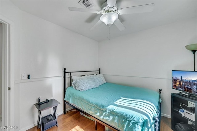 341 Waterwheel Falls Dr, Henderson, NV 89015 - bedroom with wood finished floors, baseboards, and a ceiling fan