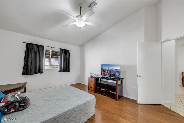 341 Waterwheel Falls Dr, Henderson, NV 89015 - bedroom featuring wood finished floors, high vaulted ceiling, ceiling fan, and baseboards