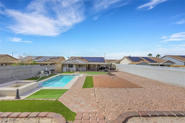 341 Waterwheel Falls Dr, Henderson, NV 89015 - view of swimming pool with a fenced backyard, a patio area, and a pool with connected hot tub