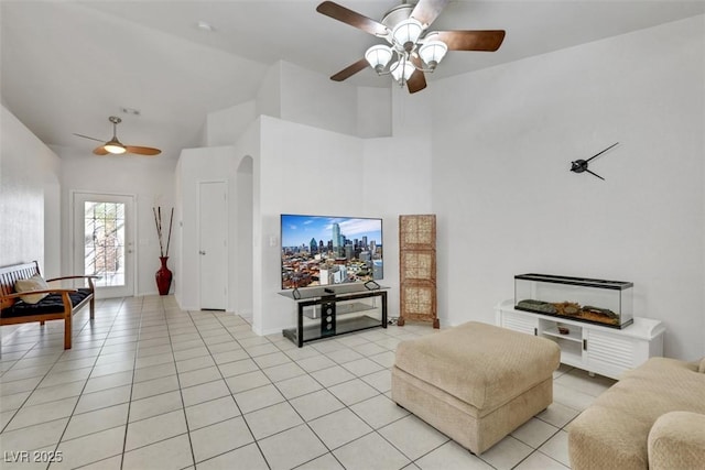 341 Waterwheel Falls Dr, Henderson, NV 89015 - living room featuring a ceiling fan, light tile patterned floors, and high vaulted ceiling
