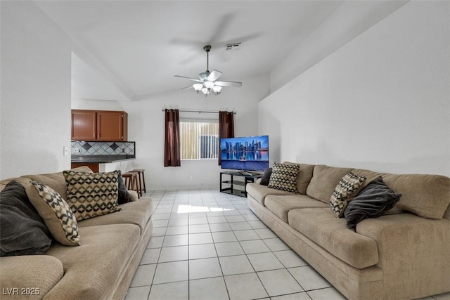 341 Waterwheel Falls Dr, Henderson, NV 89015 - living area featuring light tile patterned flooring, ceiling fan, and vaulted ceiling