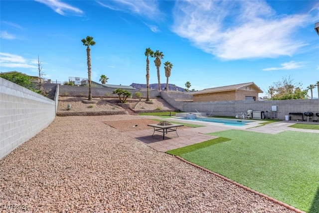 341 Waterwheel Falls Dr, Henderson, NV 89015 - surrounding community with a patio, a fenced backyard, a pool, and an outdoor fire pit