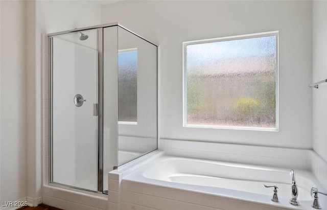 5235 E Ln Campana Dr, Pahrump, NV 89061 - full bath with a shower stall, plenty of natural light, and a bath