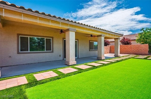 5235 E Ln Campana Dr, Pahrump, NV 89061 - back of house with ceiling fan, a patio area, and stucco siding