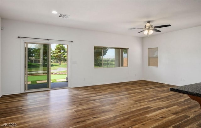 5235 E Ln Campana Dr, Pahrump, NV 89061 - spare room featuring a ceiling fan, dark wood finished floors, and recessed lighting