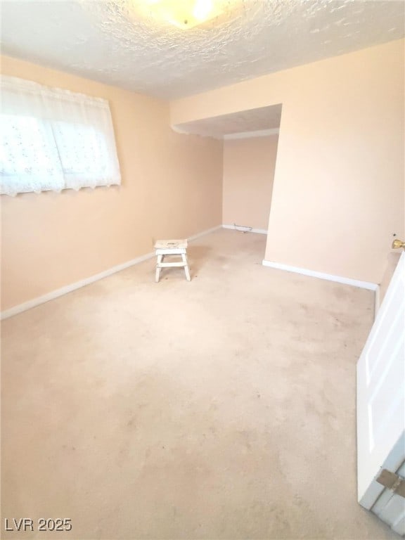 18 Third St, Mcgill, NV 89318 - carpeted spare room featuring baseboards and a textured ceiling