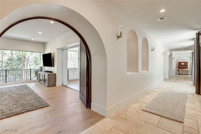 4162 Matterhorn Way, Las Vegas, NV 89124 - corridor with recessed lighting, baseboards, and arched walkways