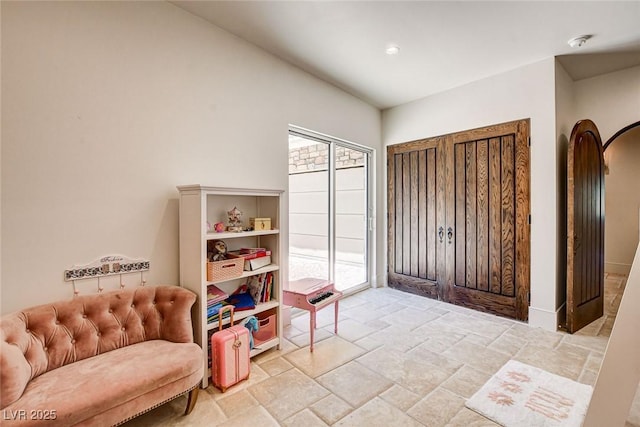 4162 Matterhorn Way, Las Vegas, NV 89124 - entryway with healthy amount of natural light, stone tile floors, and arched walkways