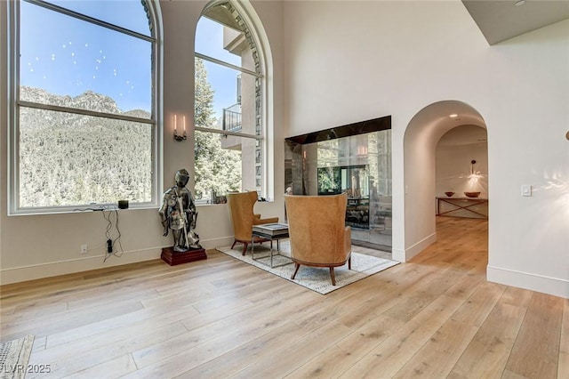 4162 Matterhorn Way, Las Vegas, NV 89124 - dining area featuring wood finished floors, arched walkways, and baseboards