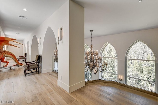 4162 Matterhorn Way, Las Vegas, NV 89124 - foyer entrance with hardwood / wood-style flooring, plenty of natural light, recessed lighting, and arched walkways