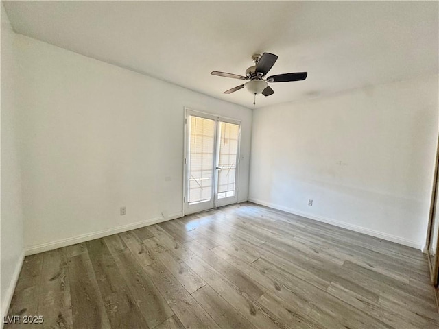 6137 W Oakey Blvd Unit A, Las Vegas, NV 89146 - empty room with wood finished floors, baseboards, and a ceiling fan