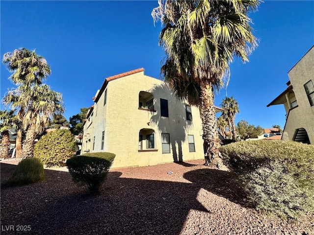 6137 W Oakey Blvd Unit A, Las Vegas, NV 89146 - view of side of home with stucco siding
