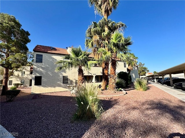 6137 W Oakey Blvd Unit A, Las Vegas, NV 89146 - view of home's exterior featuring stucco siding