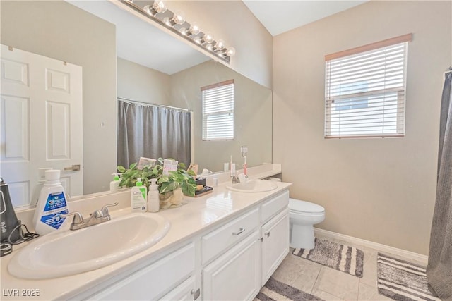 7821 Red Leaf Dr, Las Vegas, NV 89131 - bathroom with double vanity, plenty of natural light, a shower with shower curtain, and tile patterned floors