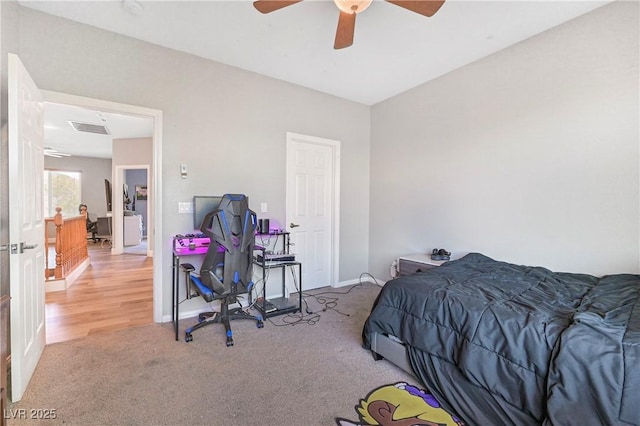 7821 Red Leaf Dr, Las Vegas, NV 89131 - bedroom with light colored carpet and a ceiling fan