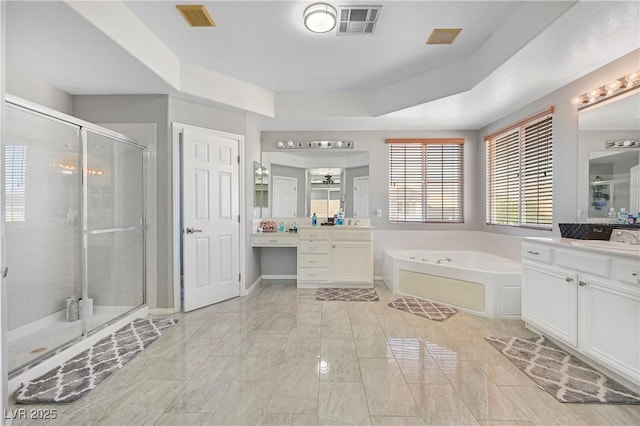 7821 Red Leaf Dr, Las Vegas, NV 89131 - full bath featuring a shower stall, a bath, two vanities, and a raised ceiling