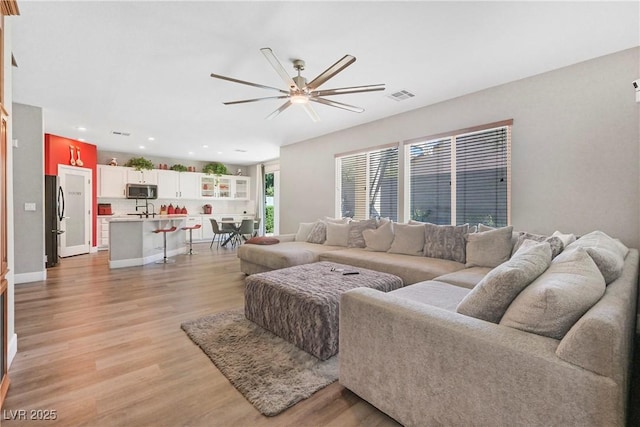 7821 Red Leaf Dr, Las Vegas, NV 89131 - living area with ceiling fan, light wood-style flooring, and recessed lighting