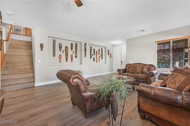 7821 Red Leaf Dr, Las Vegas, NV 89131 - living area featuring stairs, wood finished floors, and a ceiling fan
