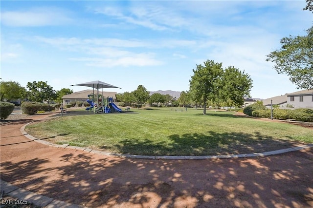 7821 Red Leaf Dr, Las Vegas, NV 89131 - view of grassy yard featuring a mountain view