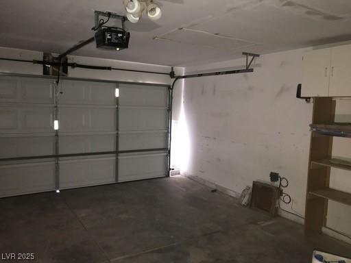 4704 Wild Oak Way N, Las Vegas, NV 89031 - garage featuring a garage door opener